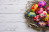 top-view-wooden-surface-with-painted-easter-eggs